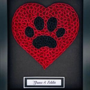 Red heart with a black paw print and a plaque reading 'Tyson & Lola'.