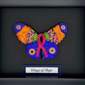 Colorful ribbon-shaped butterfly artwork titled 'Wings of Hope'.